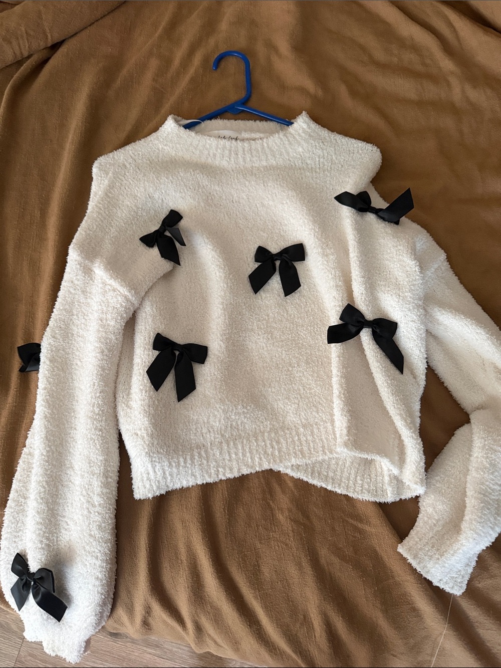 Cream Crewneck Sweater with Black Bow Accents
